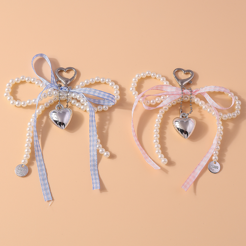 Pearl Trim Chain - Portachiavi con fiocco di perle piuttosto